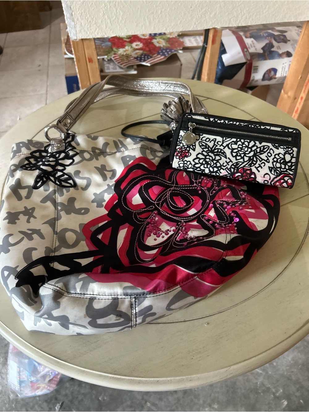 Coach Silver Logo Hobo Bag with wallet and shoes.